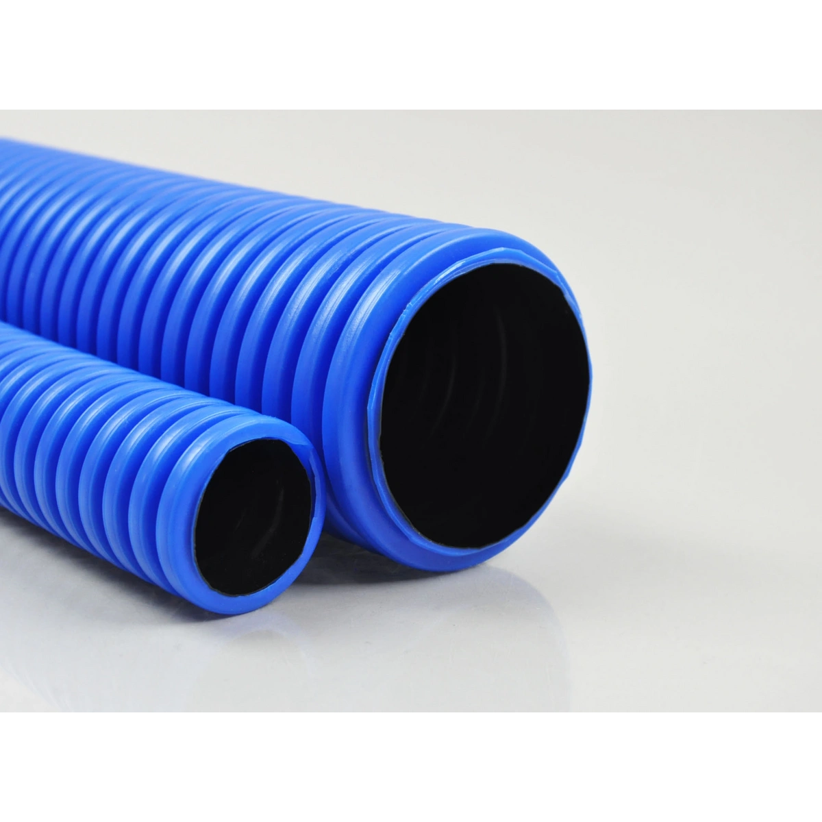 RURA KARBOWANA DWUWARSTWOWA NIEBIESKA W KRĘGACH ŚR.32mm 450N po 25M